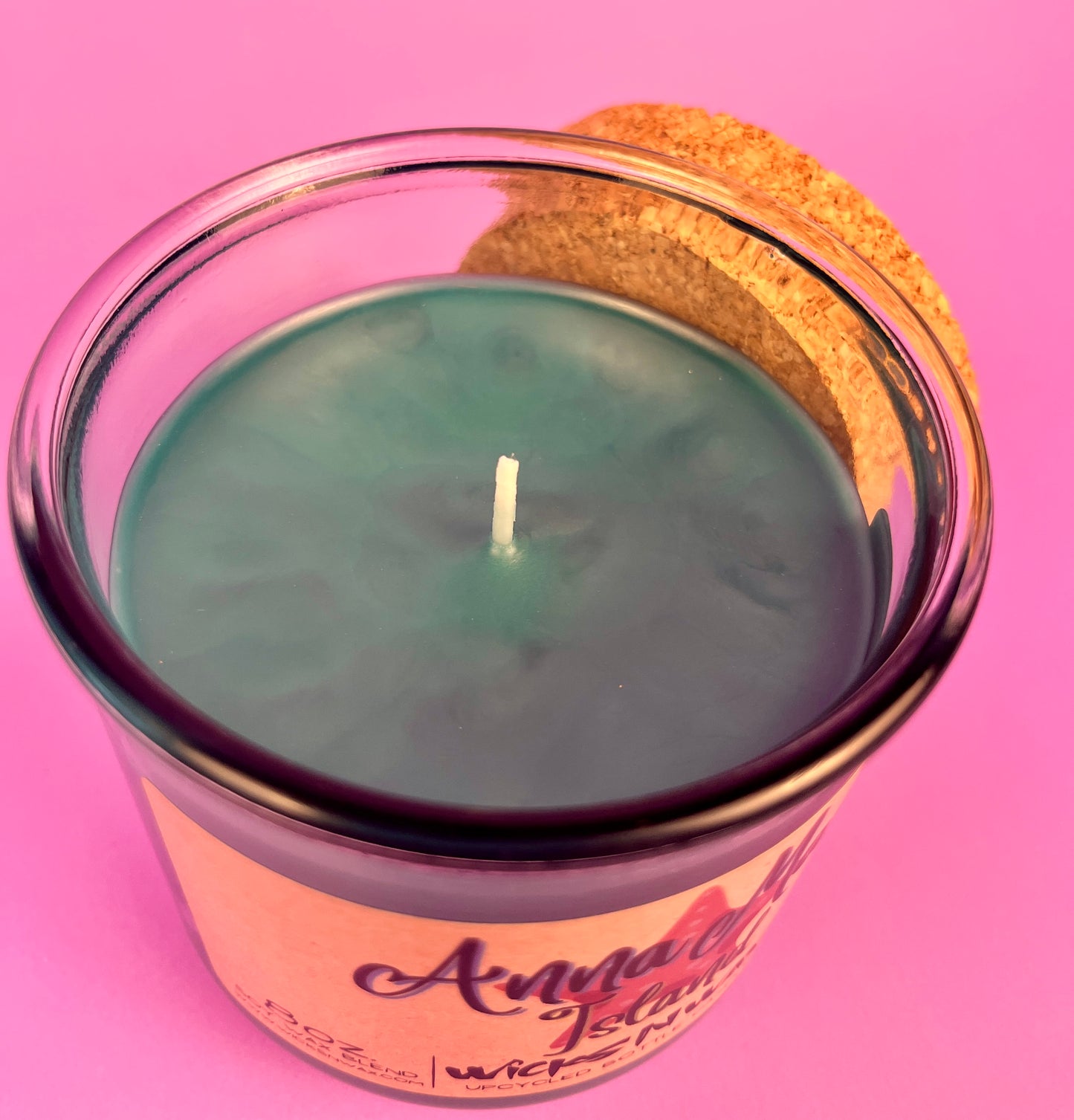 Recycled glass candle in clear jar with blue wax and cork lid, single wick