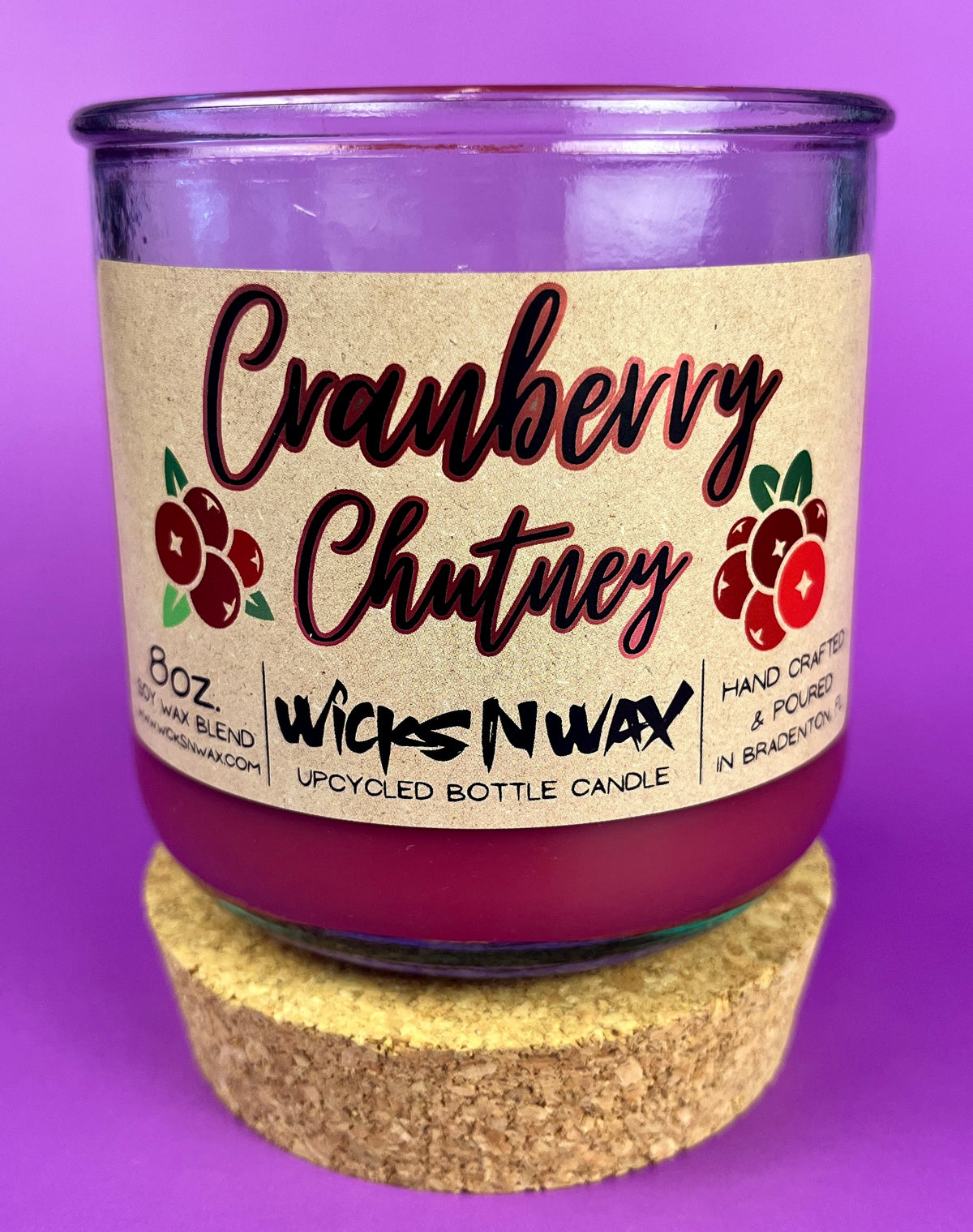Recycled glass bottle candle with cork base and cork lid, magenta wax, Cranberry Chutney label