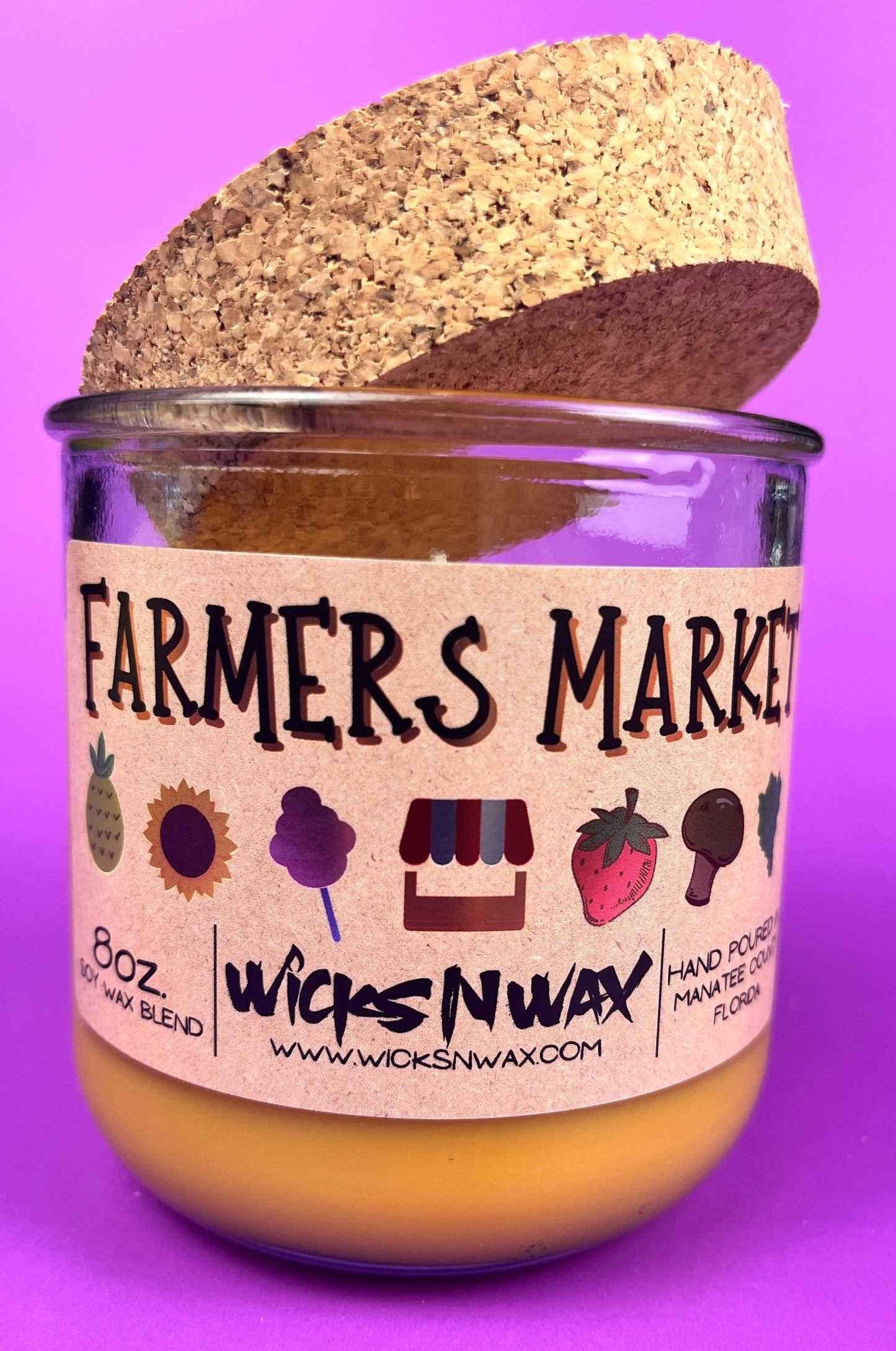 Recycled glass candle with cork lid and Farmers Market label, amber wax in jar