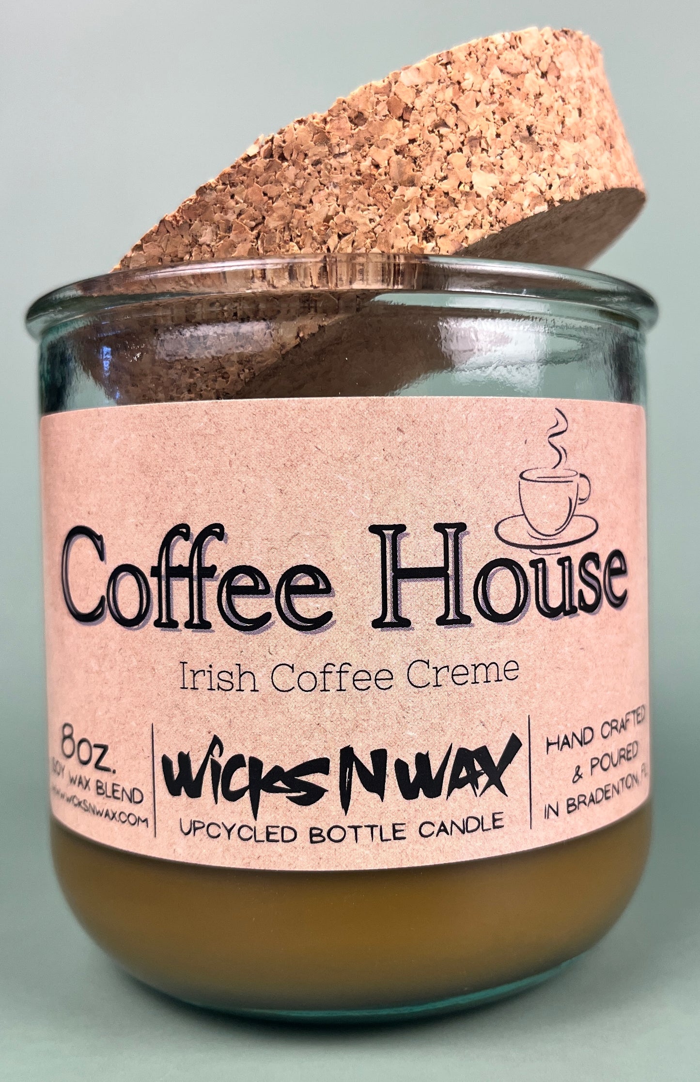 Recycled glass candle with cork coaster, amber wax, pink label: Coffee House Irish Coffee Creme