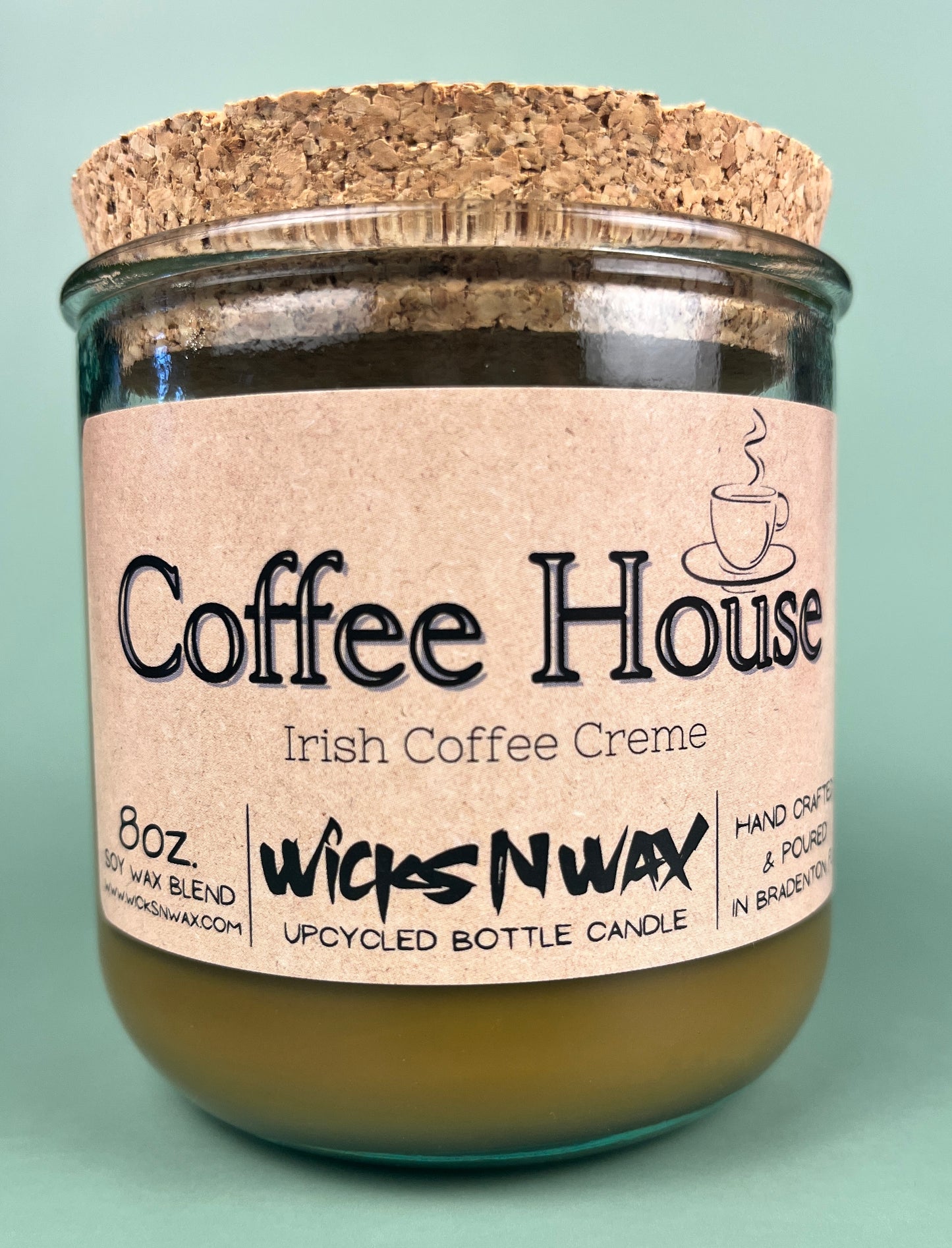 Recycled glass candle with cork coaster, amber wax, pink label: Coffee House Irish Coffee Creme