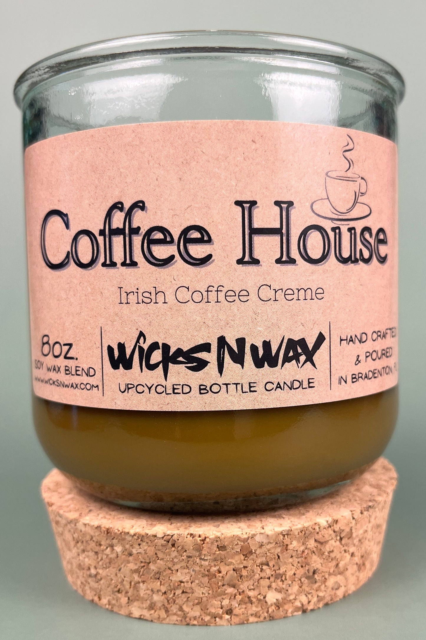 Recycled glass candle with cork base, amber wax, pink label: Coffee House Irish Coffee Creme