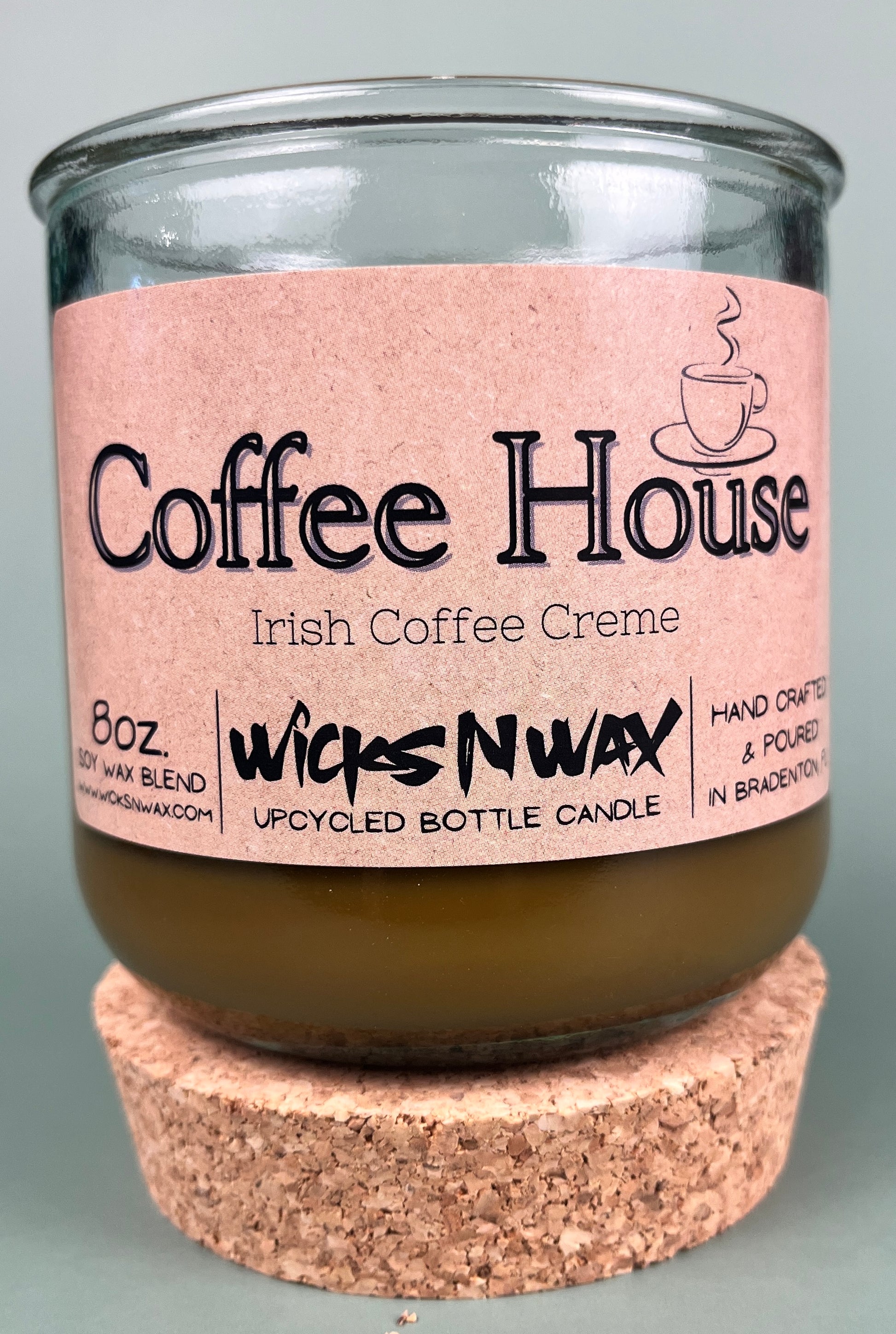 Recycled glass candle with cork base, amber wax, pink label: Coffee House Irish Coffee Creme