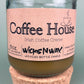 Recycled glass candle with cork base, amber wax, pink label: Coffee House Irish Coffee Creme