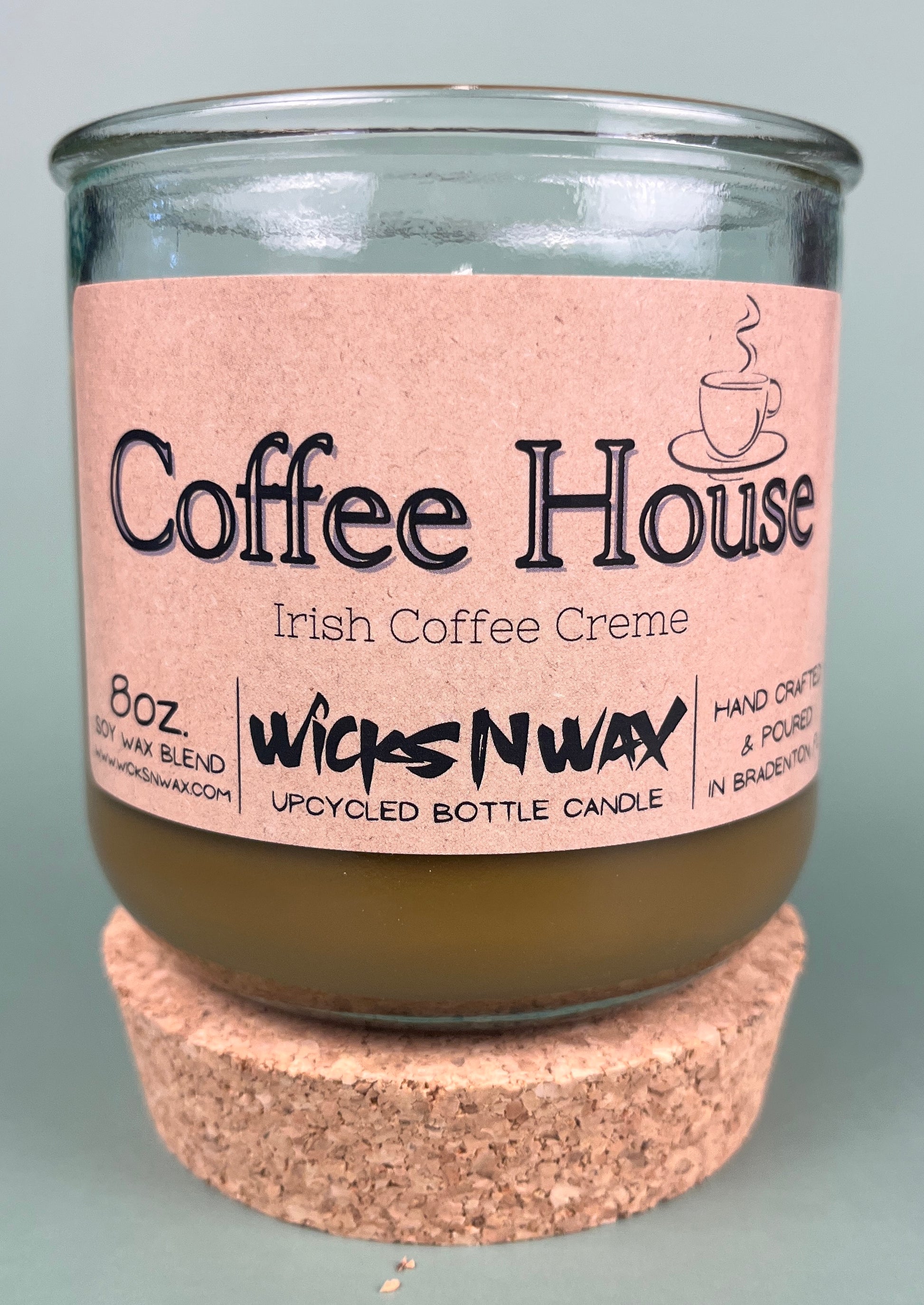 Recycled glass candle with cork base, amber wax, pink label: Coffee House Irish Coffee Creme