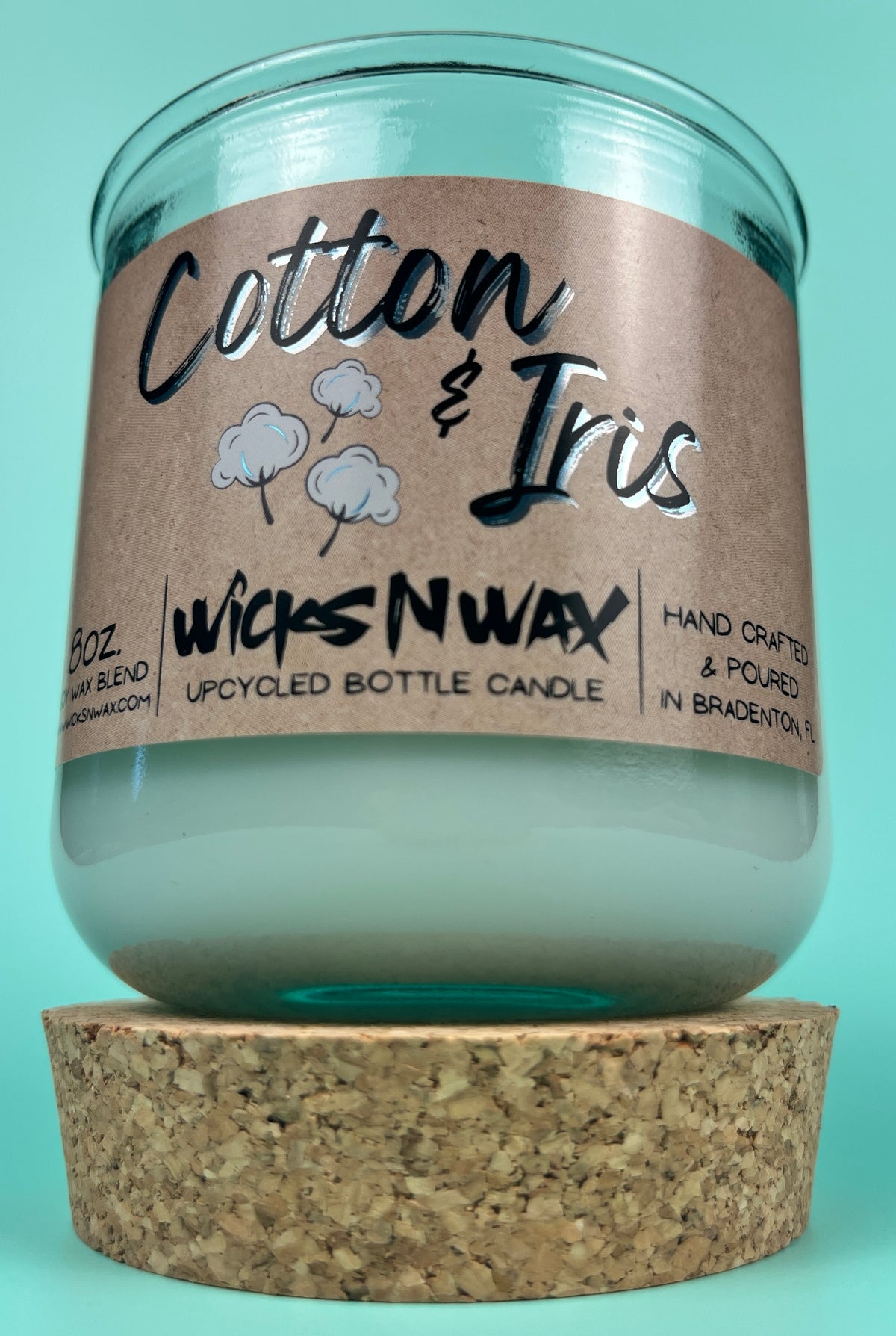 Recycled glass candle with cork base and “Cotton & Iris” kraft label