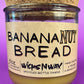 Banana nut bread scented candle in recycled glass jar with cork lid, cream wax