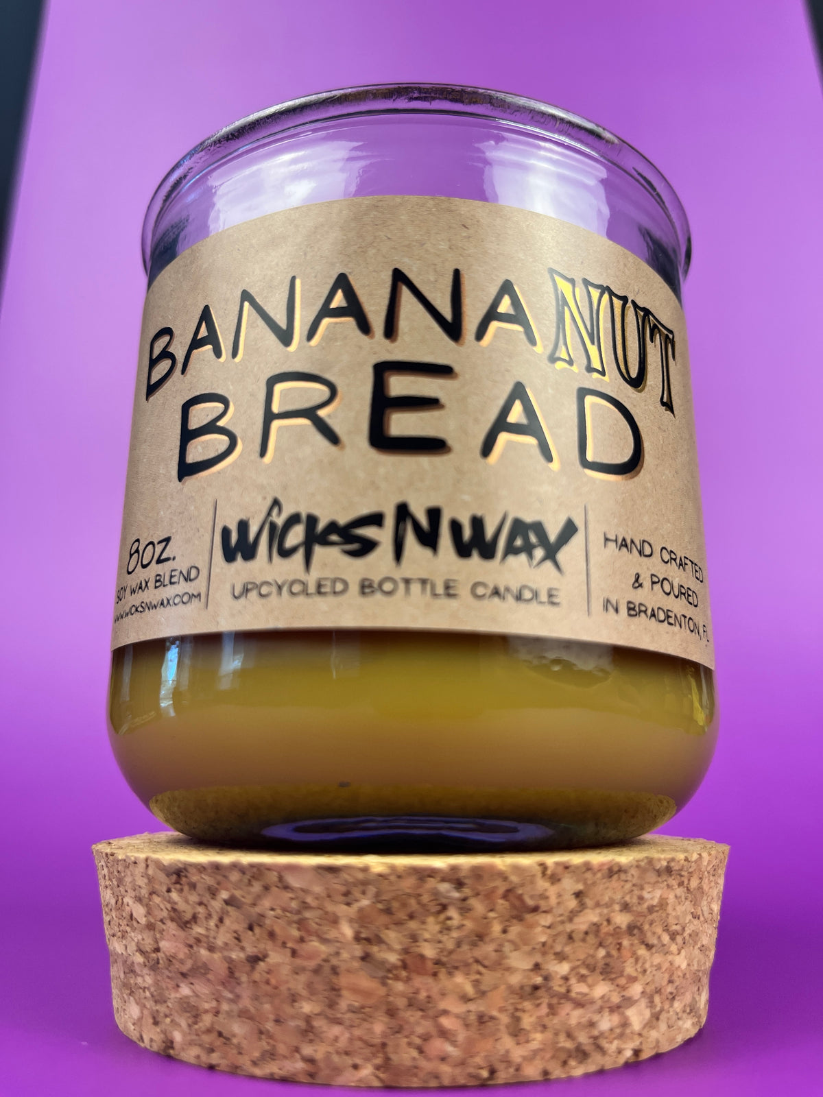 Recycled glass candle jar with Banana Nut Bread kraft label and beige wax