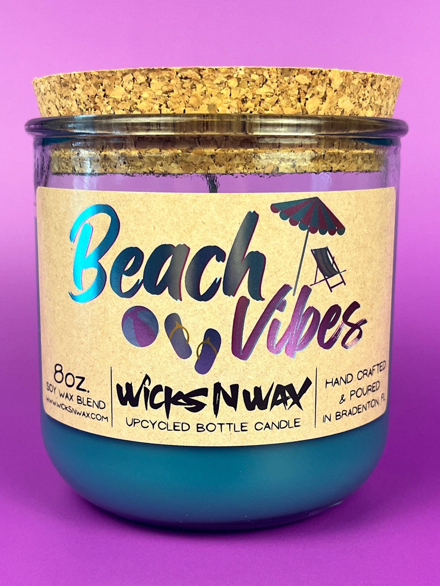 Recycled glass candle in blue jar with cork lid and Beach Vibes label, 8 oz