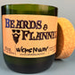 Dark green candle jar with cork lid and Beards & Flannel label