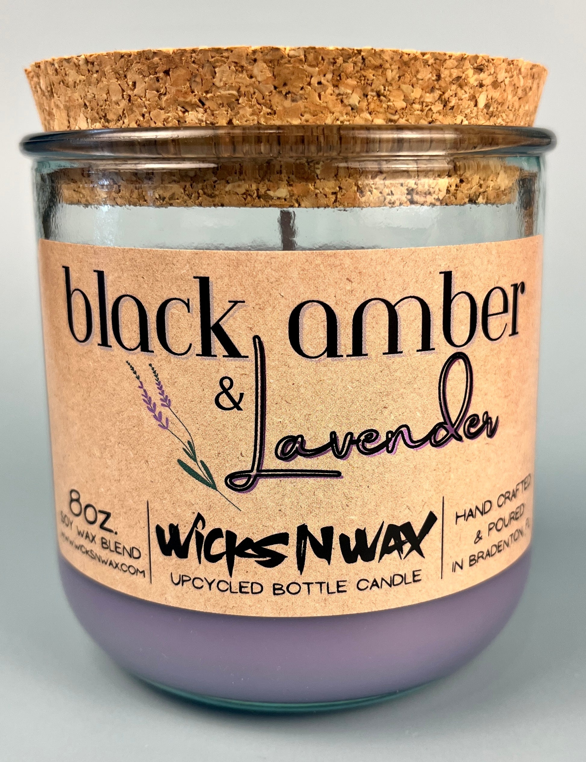 Recycled glass candle jar with cork lid, purple wax; WicksNWax Black Amber & Lavender on label