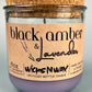 Front view recycled glass candle jar with cork lid and purple wax; WicksNWax Black Amber & Lavender