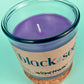 Recycled glass candle with cork band, blue glass jar with purple wax and wick