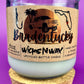 Recycled glass candle in clear jar with white wax and beige printed label, cork base.
