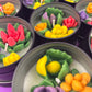 Small cactus art tin set close-up of green leaf and yellow flower wax pieces