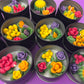 Small cactus art tin set with assorted red, purple, and yellow flower wax cups