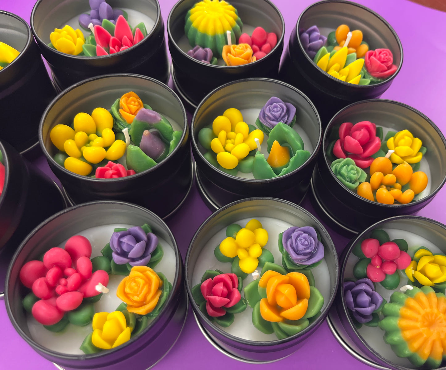 Small cactus art tin set with assorted red, purple, and yellow flower wax cups