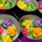 Small cactus art tin set with multiple cups of colorful flower and leaf wax