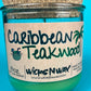 Recycled glass candle with green wax in glass jar, WicksNWax label