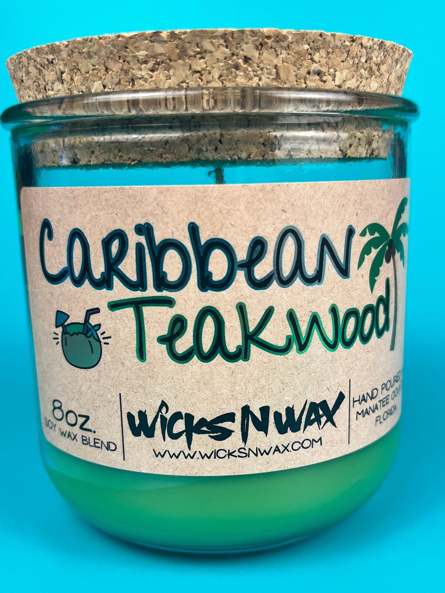 Recycled glass candle with green wax in glass jar, WicksNWax label