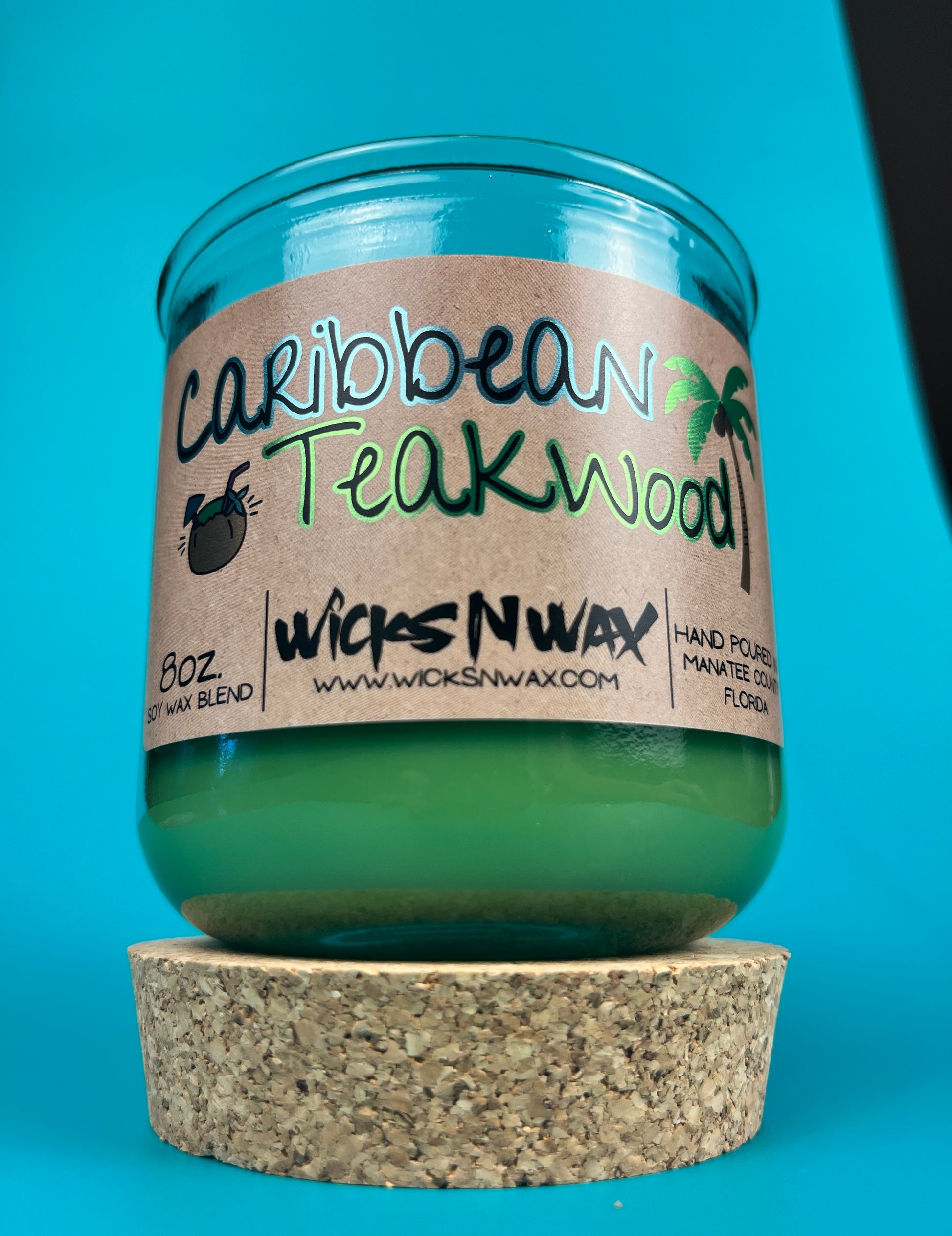 Recycled glass candle with green wax and cork base, Caribbean Teakwood label, WicksNWax