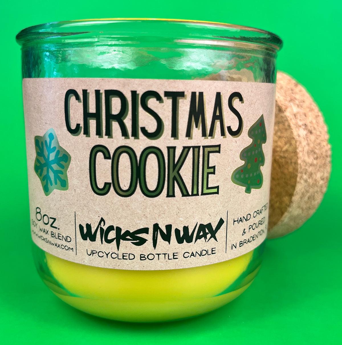 Christmas Cookie recycled-glass candle in green jar, cork lid and side view with label