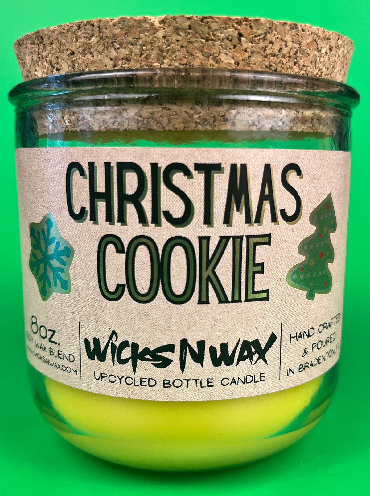 Christmas Cookie recycled-glass candle with front label, green glass jar and yellow wax
