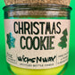 Christmas Cookie recycled-glass candle, green jar with cork lid and bright yellow wax