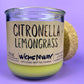 Recycled glass candle with green wax and “Citronella Lemongrass” label on front