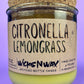 Recycled glass candle with green wax and “Citronella Lemongrass” label, cork lid