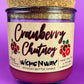 Recycled glass bottle candle with cork lid, magenta wax, Cranberry Chutney label on front