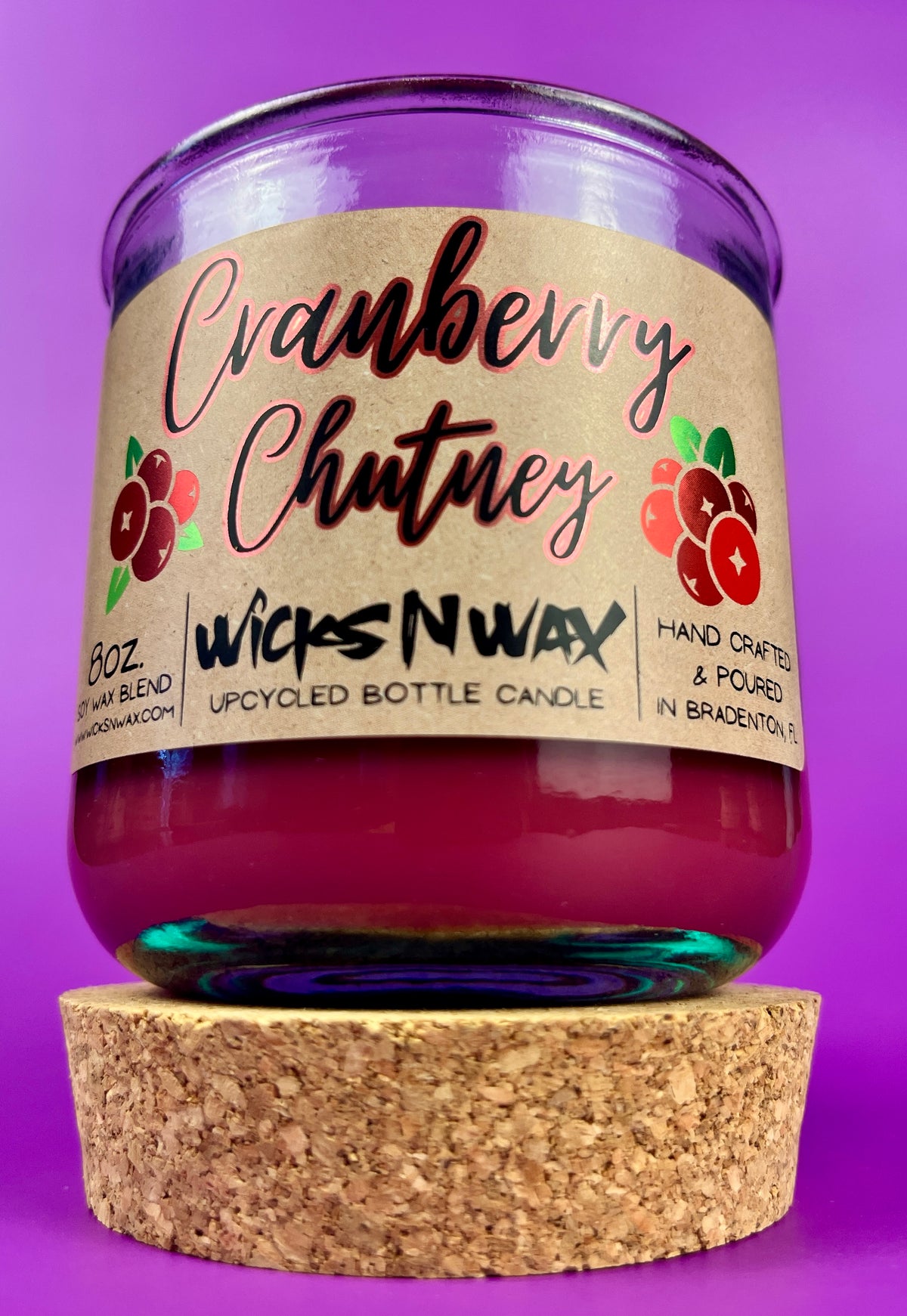 Recycled glass candle jar with Cranberry Chutney label, purple glass