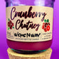 Recycled glass bottle candle with cork base and cork lid, magenta wax, Cranberry Chutney label