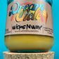 Recycled glass candle jar on cork base, yellow wax, printed label and wick