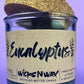 Eucalyptus recycled glass candle: dark green wax jar with cork lid on top