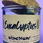 Eucalyptus recycled glass candle: dark green wax in clear jar with cork lid