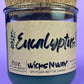 Eucalyptus recycled glass candle with cork lid; centered WicksNWax label; dark wax