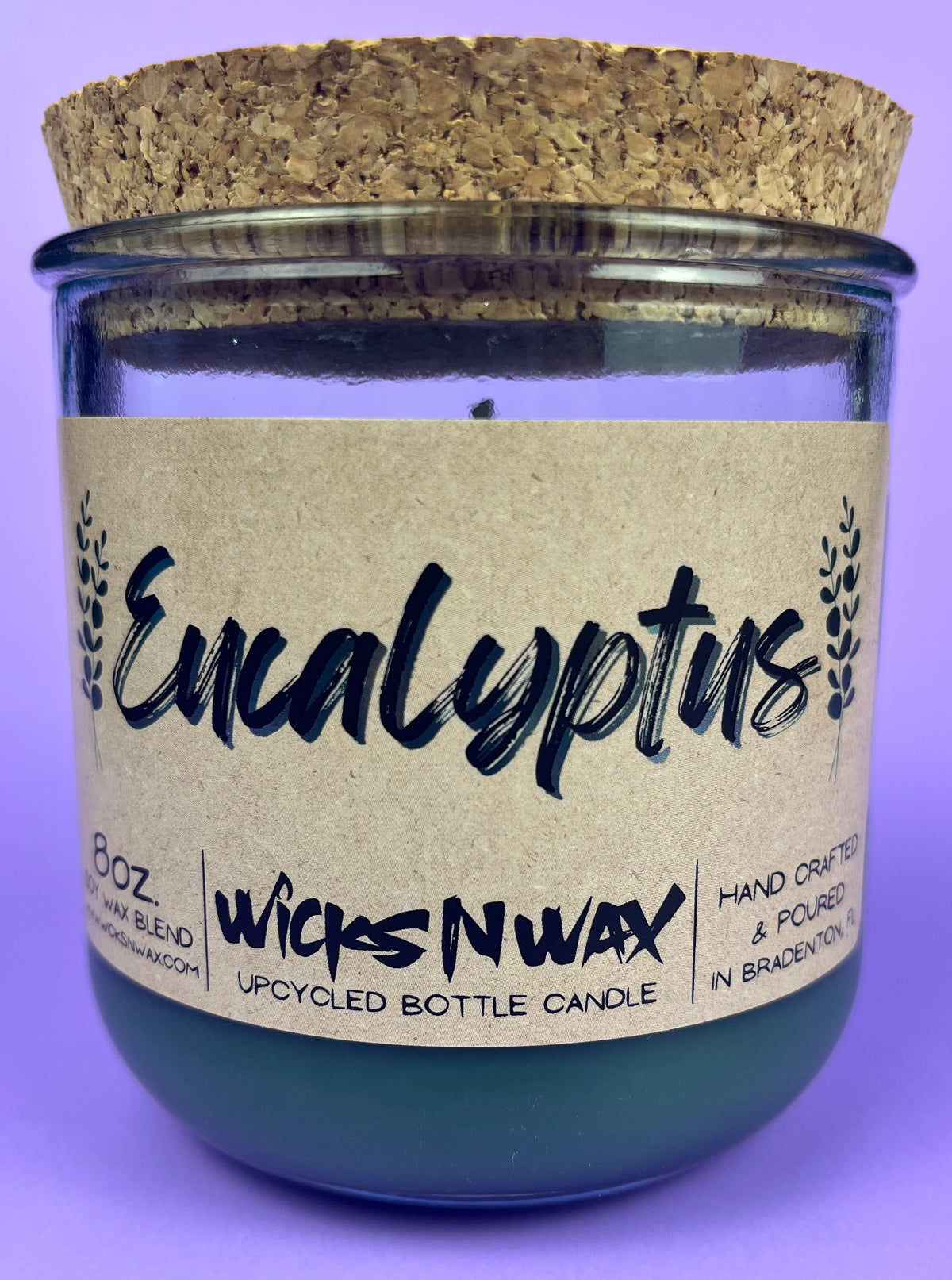 Eucalyptus recycled glass candle, dark green wax jar with front label and cork lid