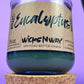 Eucalyptus recycled glass candle, dark green wax in clear jar with cork base