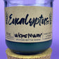 Eucalyptus recycled glass candle, dark green wax in clear jar with cork base