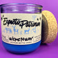 Blue glass candle jar with cream label, black illustration, and cork base ring