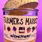 Recycled glass candle with cork lid and Farmers Market label, amber wax in jar