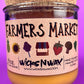 Recycled glass candle with Farmers Market label, cork lid, amber wax in jar