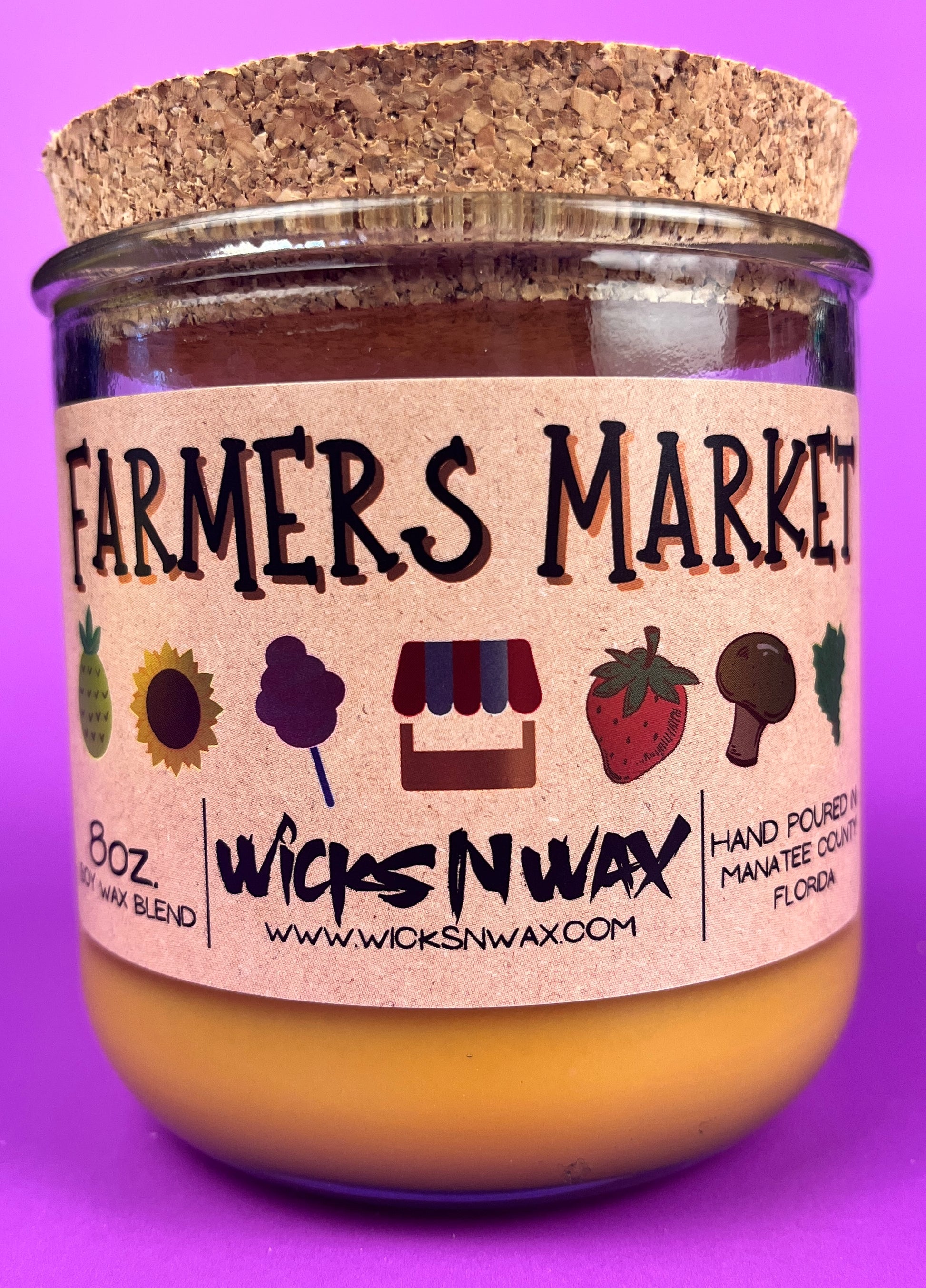 Recycled glass candle with Farmers Market label, cork lid, amber wax in jar