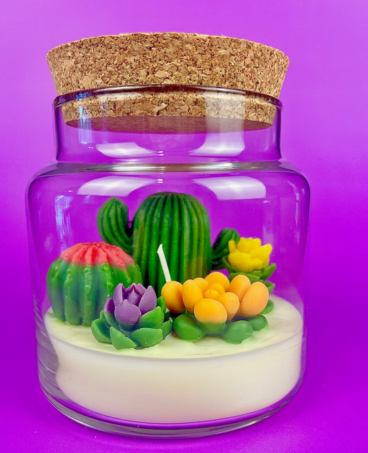 Cactus art candle with clear glass jar, cork top, white wax and colorful cactus accents