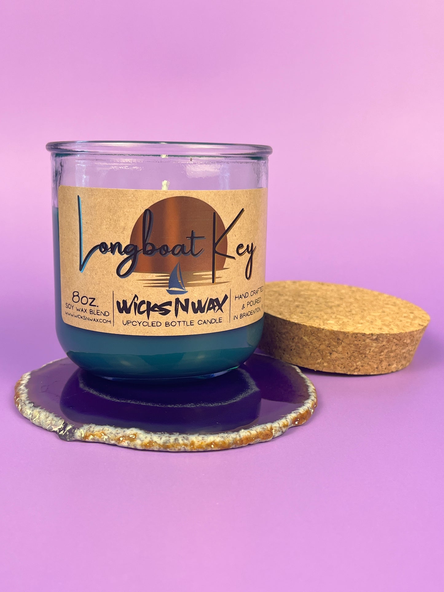 Recycled glass candle in blue wax, cork lid and coaster set, front label visible