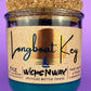 Recycled glass candle in blue jar with cork lid and WicksNWax label