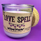 Recycled glass candle, purple jar with cork lid; beige 'LOVE SPELL' label and exposed wick