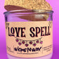 Recycled glass candle, purple jar with cork lid; beige 'LOVE SPELL' label on front
