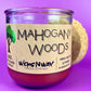 Recycled glass candle jar, cork lid with purple wax; label details visible.